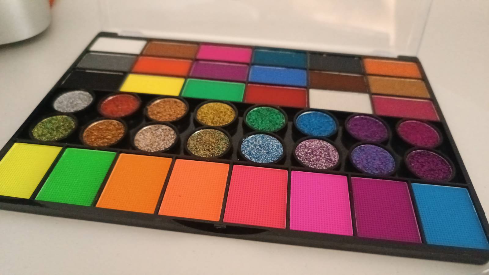 A children's face-paint kit with brushes